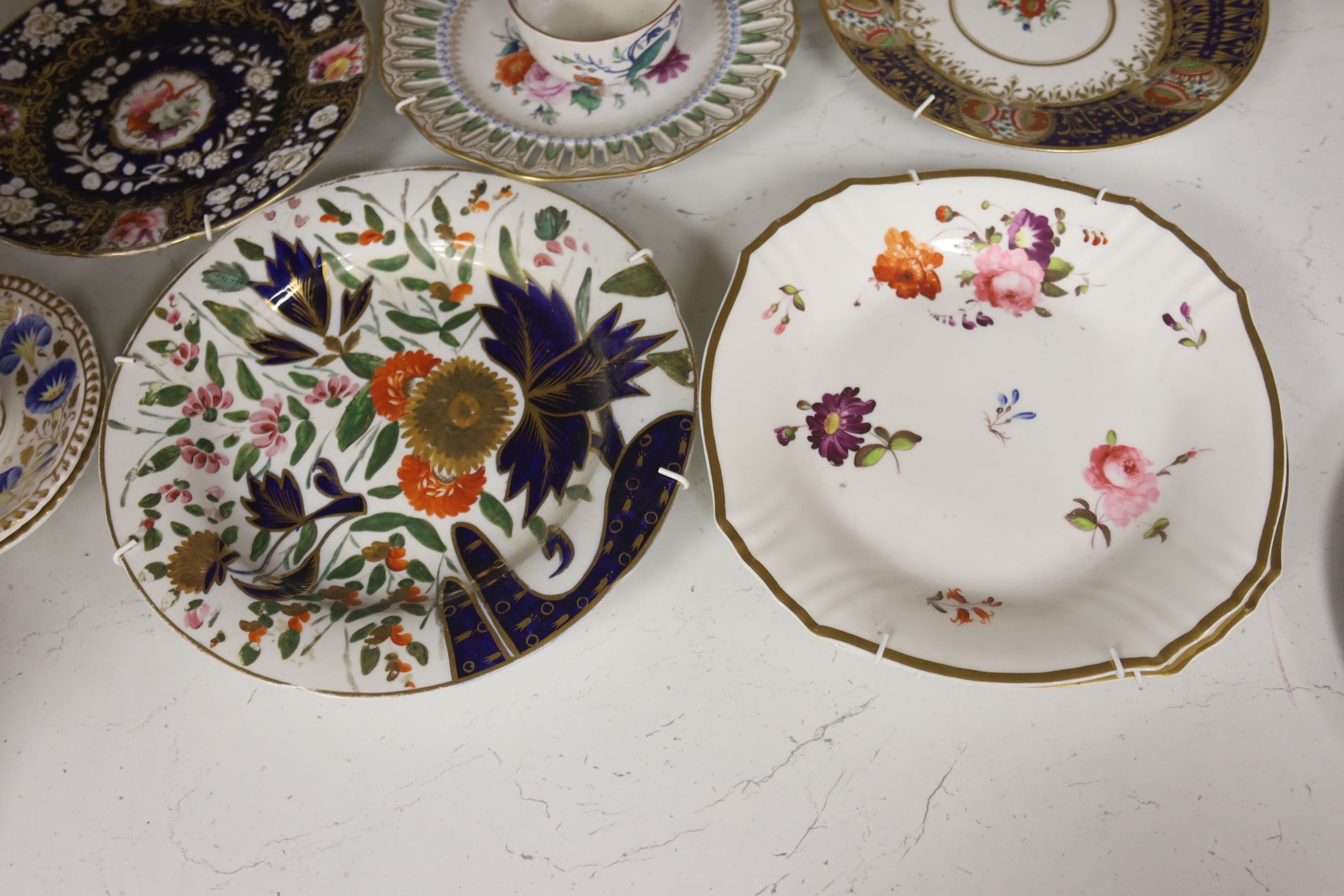 The collection of 19th century English and German porcelain plates, two coffee cups and saucers etc.